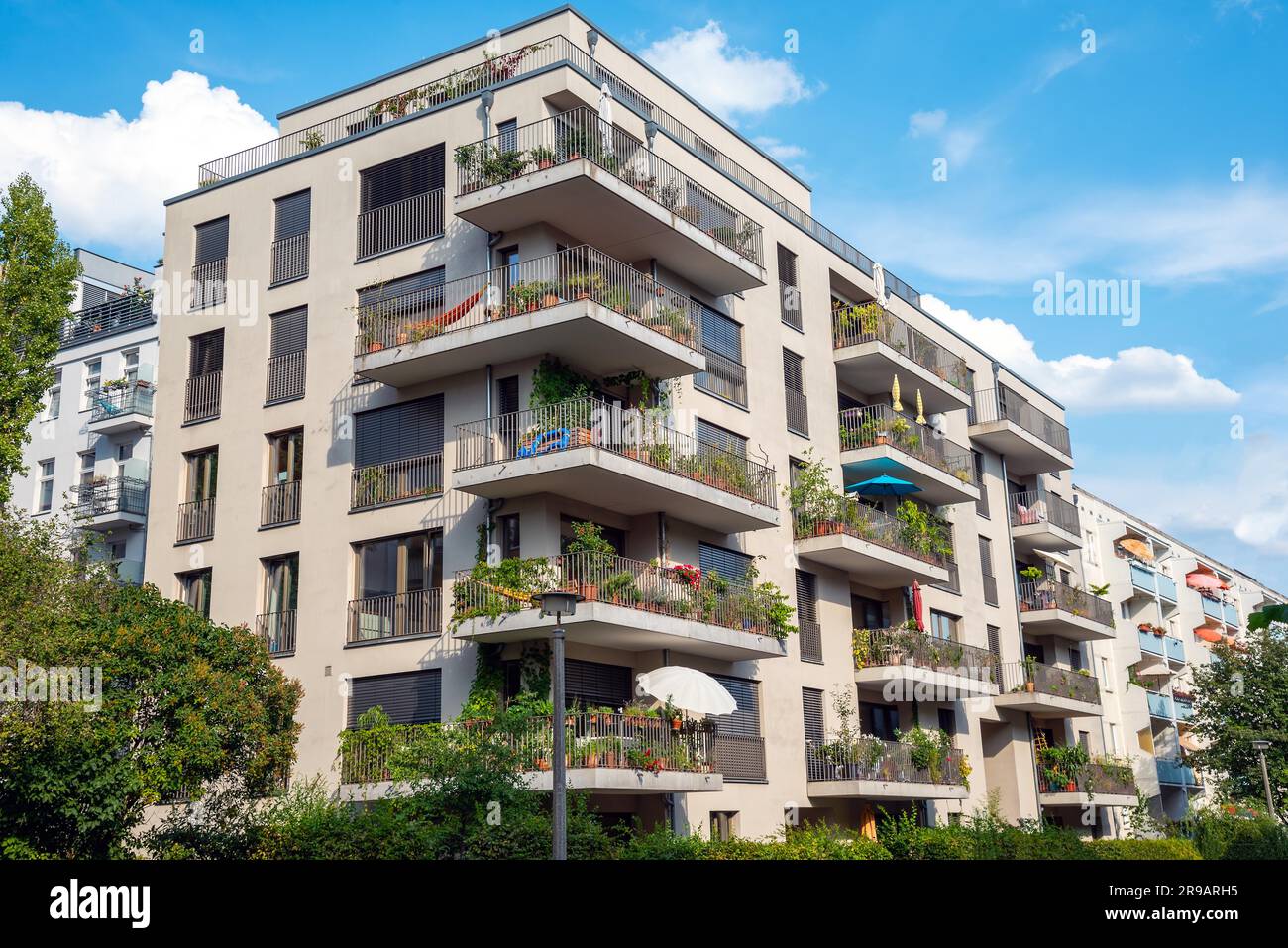 Grey modern apartment building with balconies seen in Berlin, Germany ...
