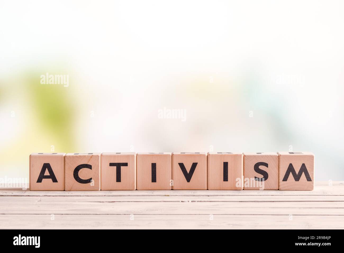 Activism word on wooden cubes on a table Stock Photo