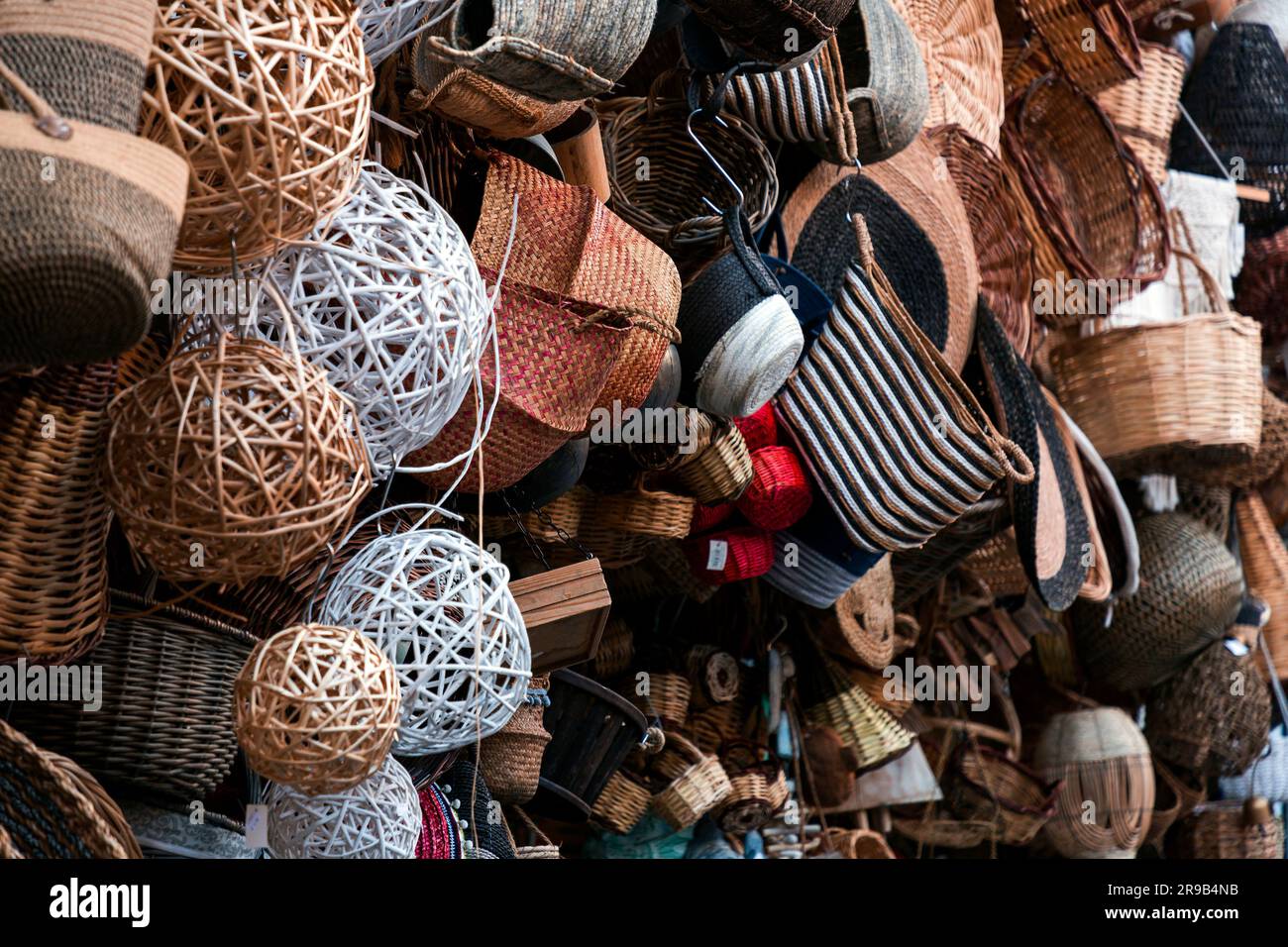 Athens, Greece - 25 Nov 2021: Traditional handmade baskets and household items sold at a basket shop in Athens, Greece. Stock Photo