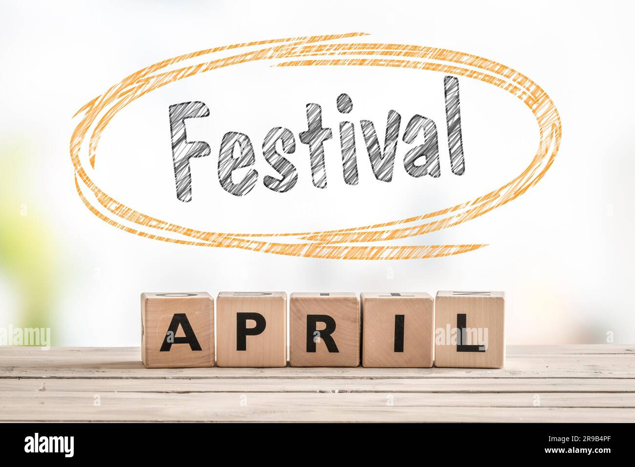 Festival in april launch sign made of wooden cubes Stock Photo - Alamy