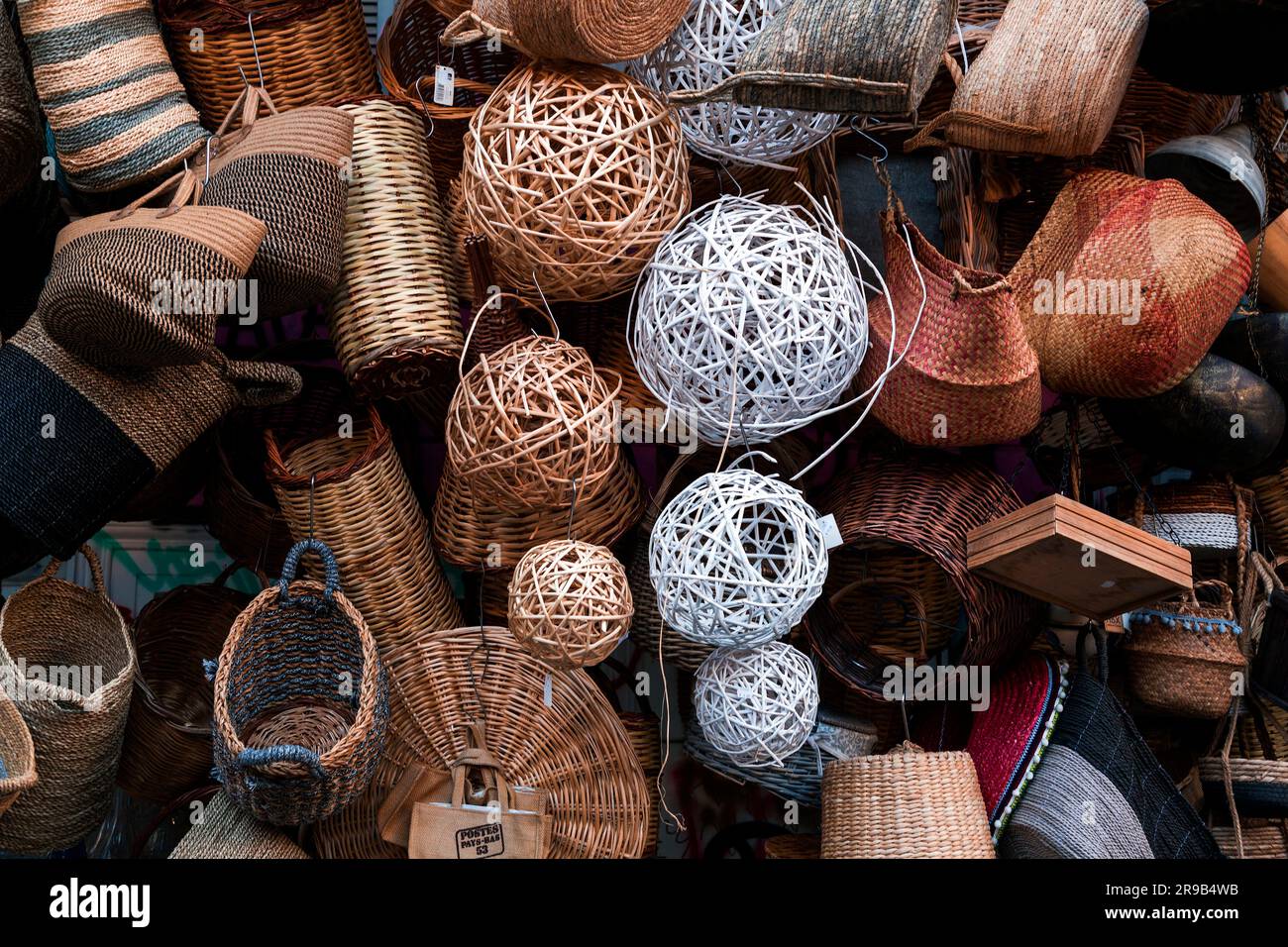 Athens, Greece - 25 Nov 2021: Traditional handmade baskets and household items sold at a basket shop in Athens, Greece. Stock Photo