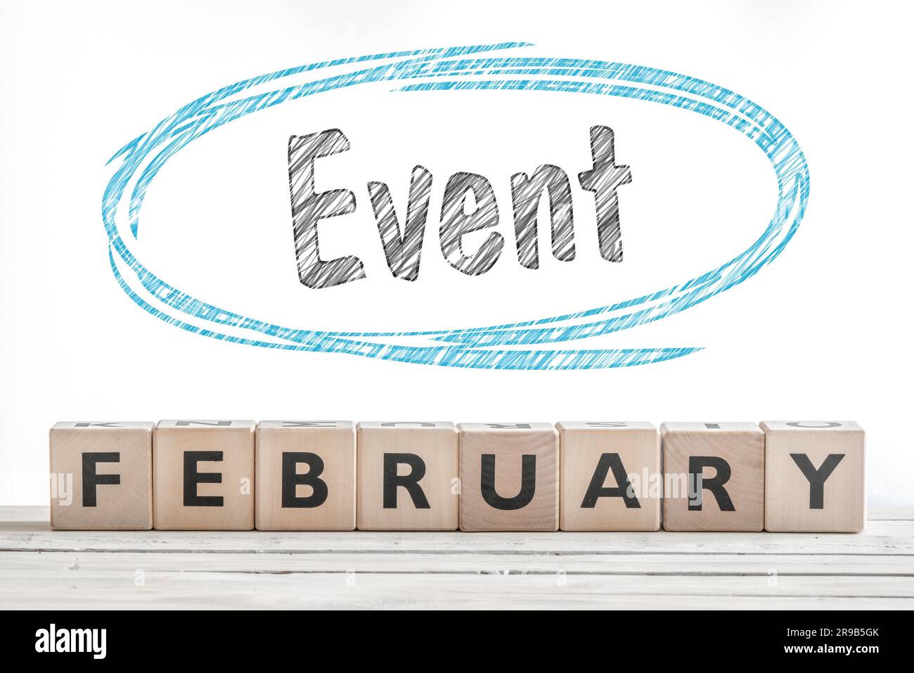 February event sign made of wood on a stage Stock Photo - Alamy