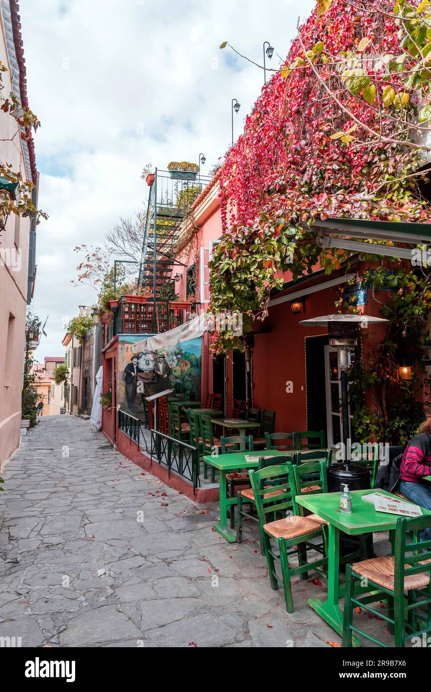 Athens, Greece - 25 Nov 2021: Cafes and restaurants  in the scenic streets of Plaka district in Athens, the Greek capital. Stock Photo