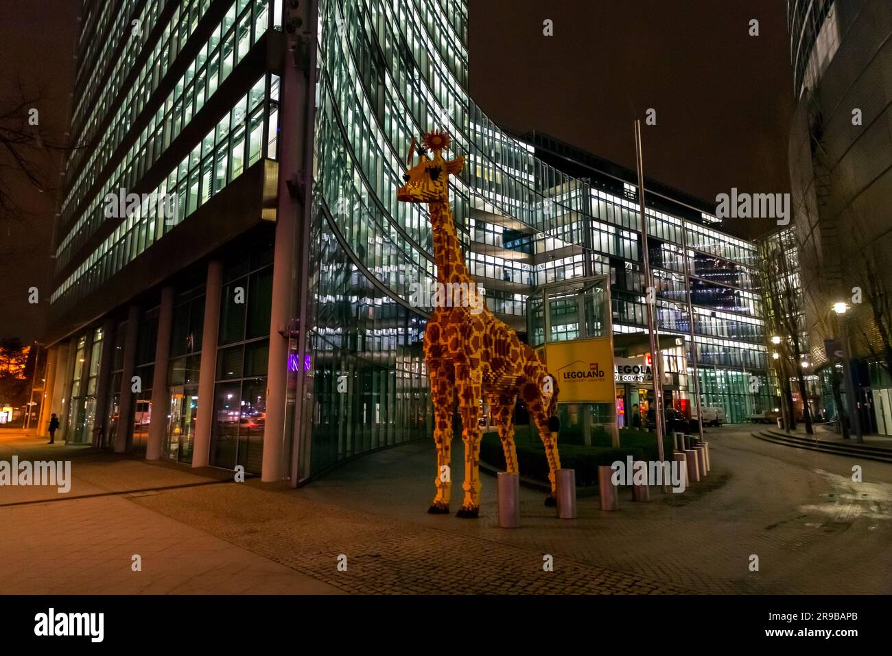 Berlin, Germany - 17 DEC 2021: Huge plastic giraffe statue in front of