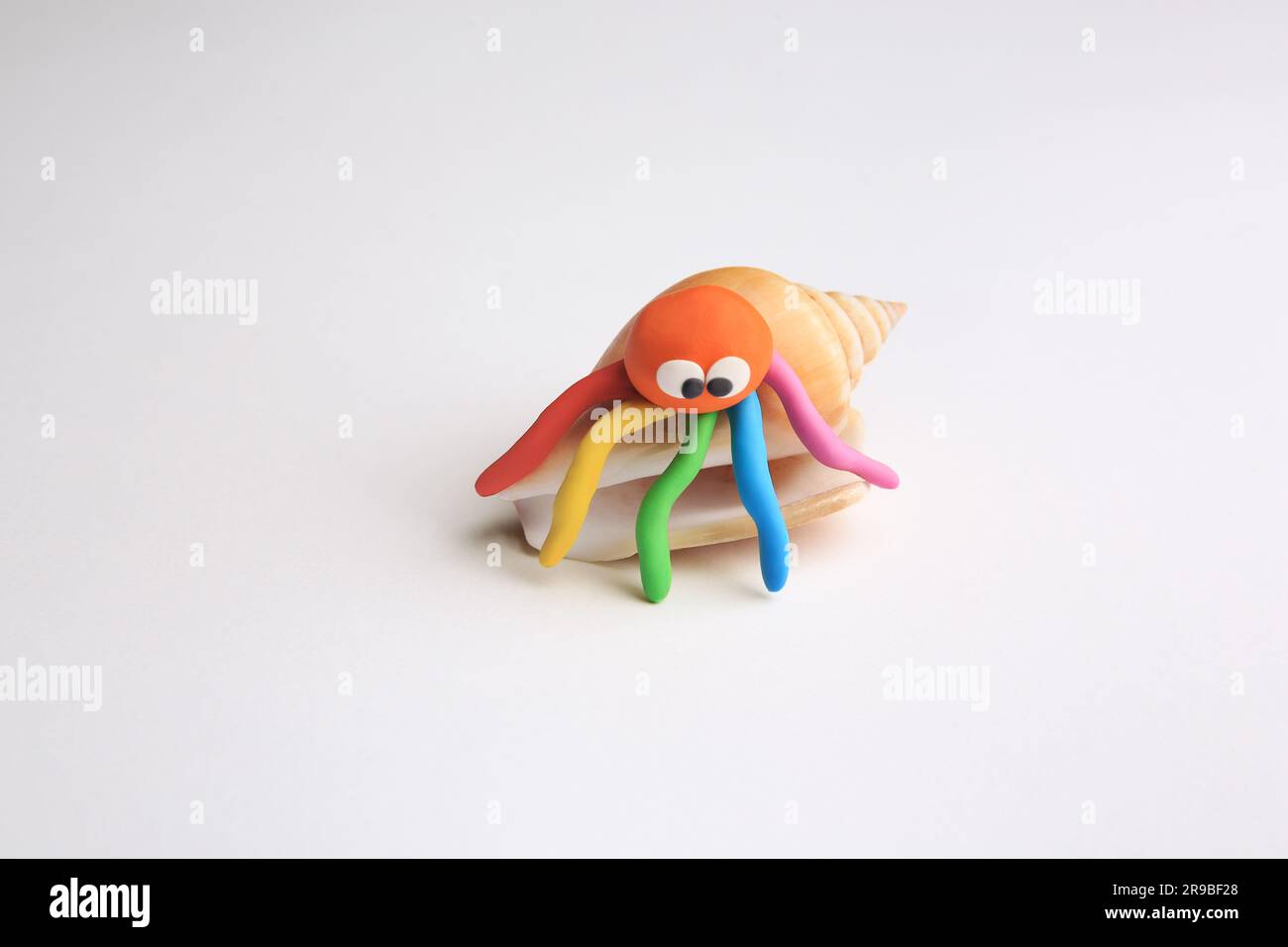 Beautiful plasticine octopus isolated on white. Children's handmade ideas Stock Photo