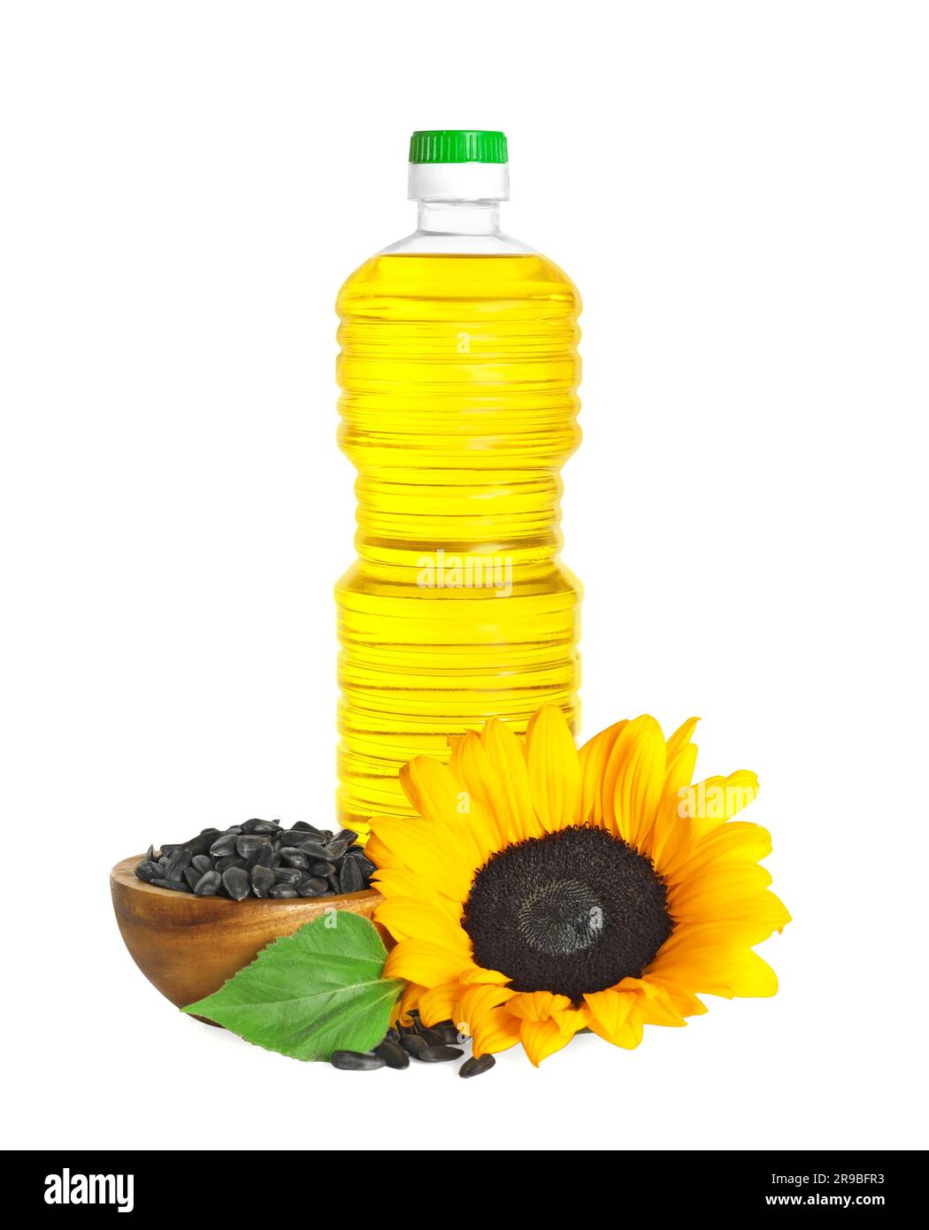 Sunflower cooking oil, seeds and yellow flower on white background Stock Photo Alamy