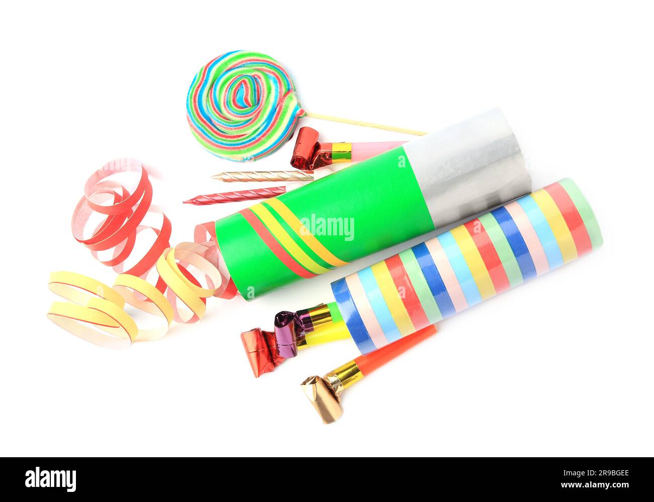 Party crackers and different festive items isolated on white, top view