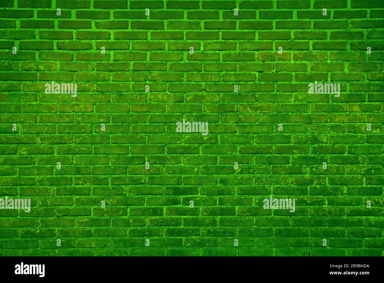 Texture of bright green brick wall as background Stock Photo - Alamy