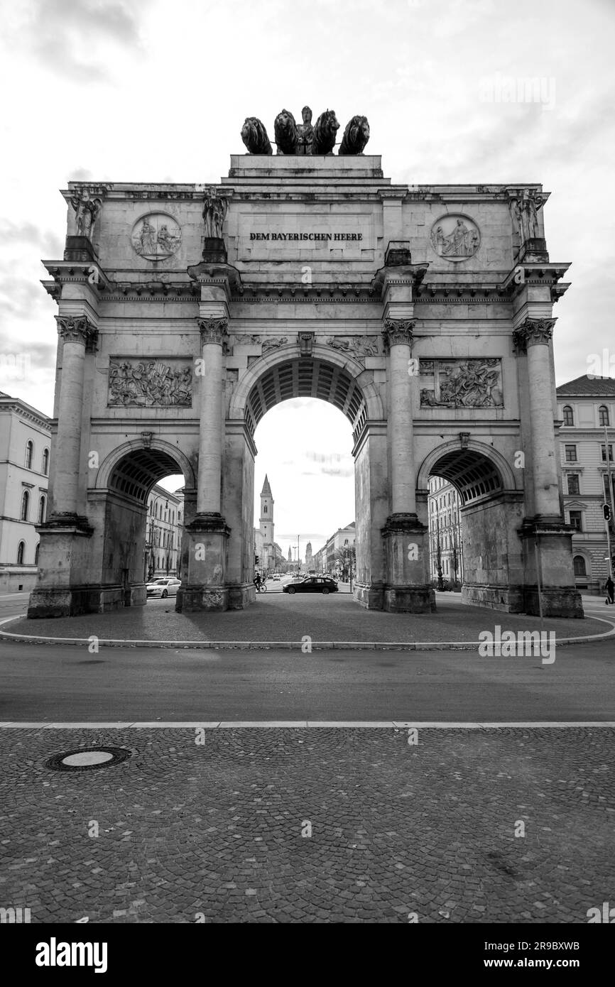 The Siegestor, The Victory Gate in Munich is a three arched memorial arch, crowned with a statue of Bavaria with a lion quadriga. Stock Photo