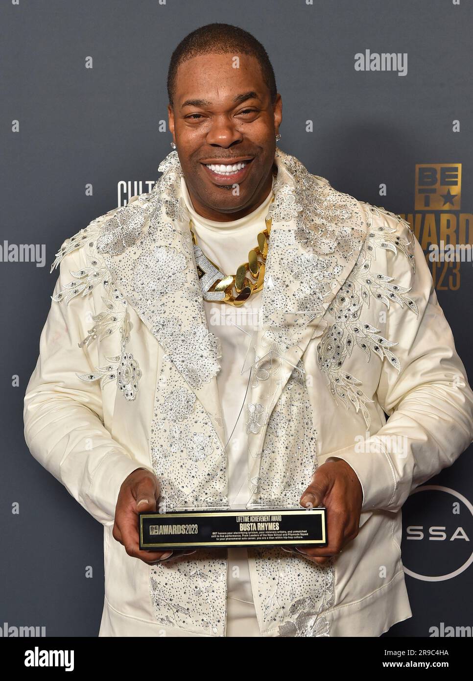 Busta Rhymes poses in the press room with the lifetime achievement
