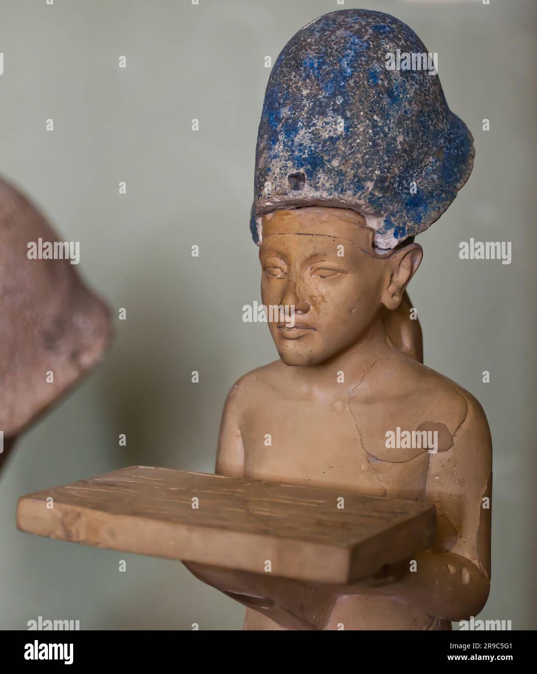Statue of Ahkenaten wearing the blue crown. The Egyptian Museum in Cairo. Stock Photo