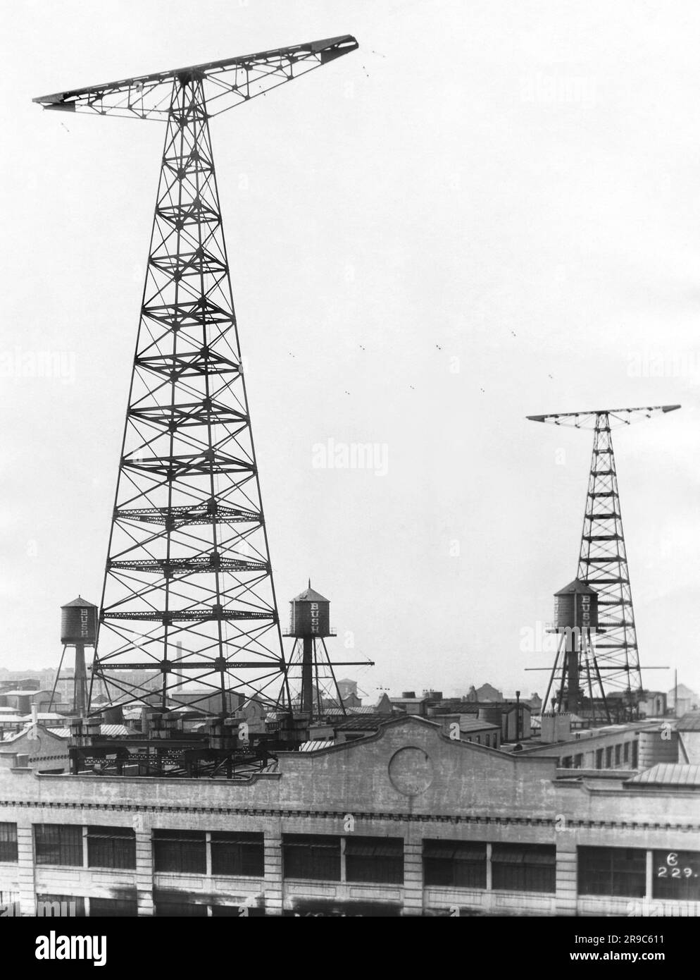 New York, New York:  1924 The towers of WNY radio station atop the Bush Terminal in Brooklyn. Stock Photo