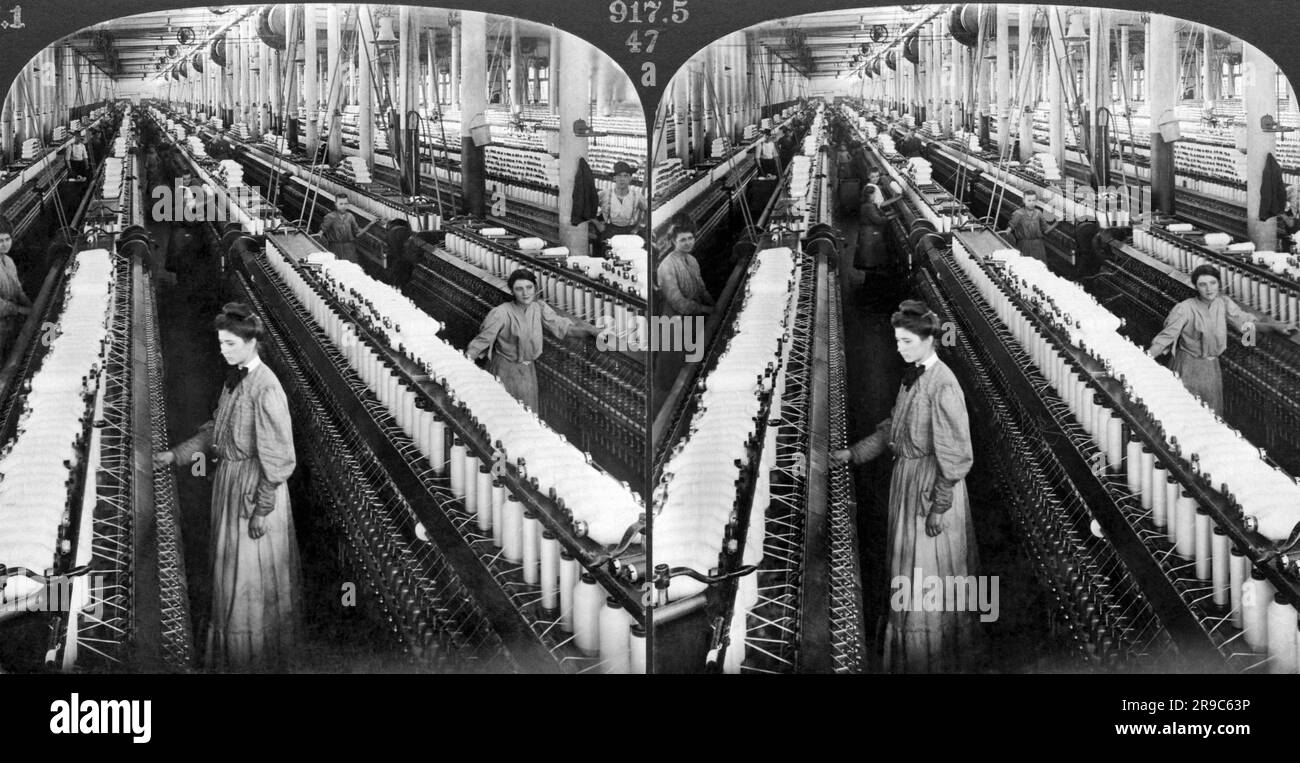 Greensboro, North Carolina:  1903 A stereocard showing women and girls working in the spinning room with 60,000 spindles in the White Oak Cotton Mill. Stock Photo