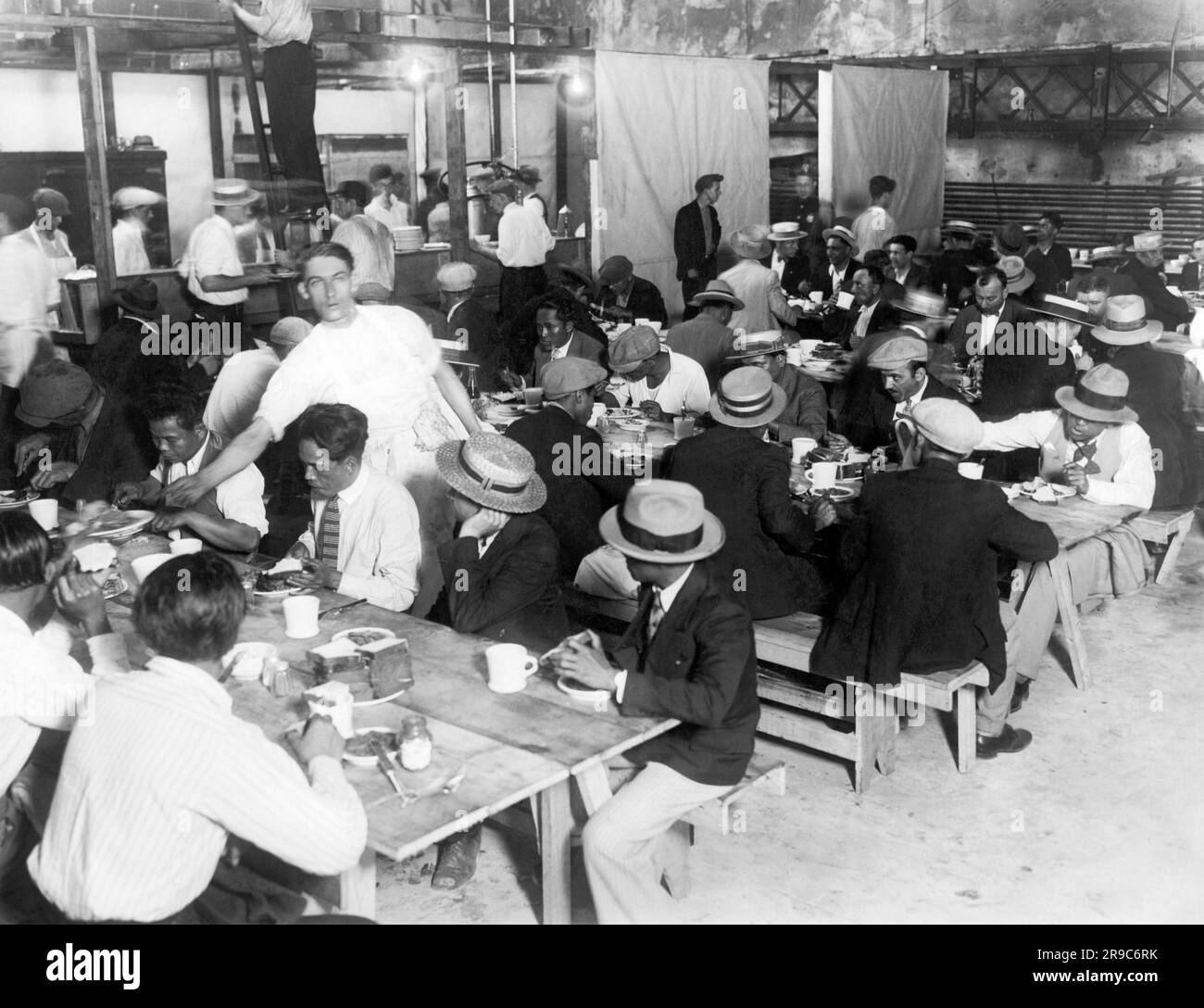 New York, New York:   July 25, 1927 Interborough Rapid Transit (I.R.T.) officials are ready to deal with the threatened walkout by members of the Amalgamated Association of Street and Electric Railway Empoyees. Shown are the eating quarters that the IRT has set up for their strikebreakers to use during the strike. Stock Photo