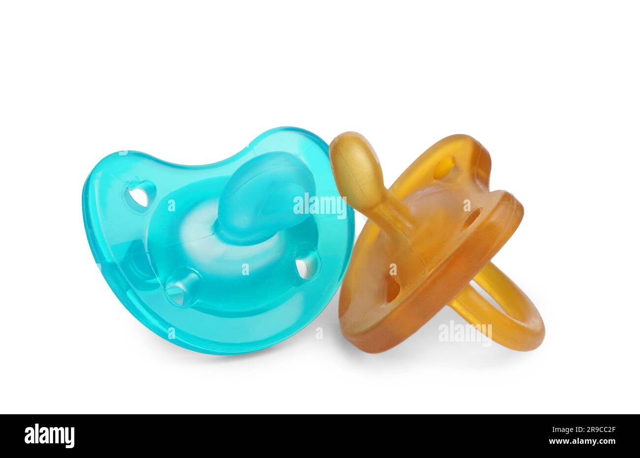 New different baby pacifiers on white background Stock Photo Alamy