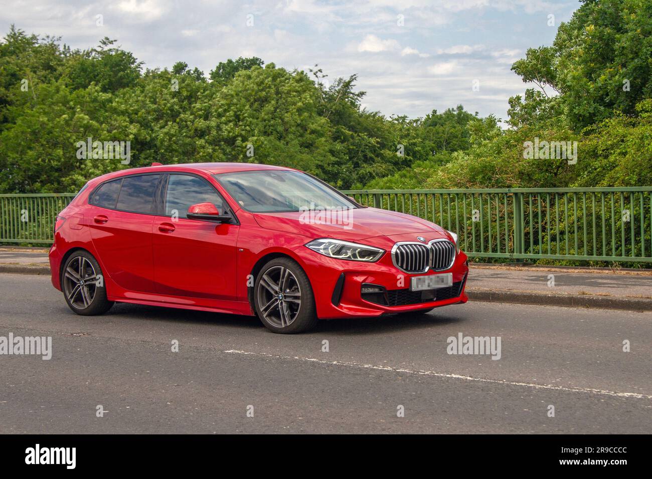 2021 Red BMW 118I M Sport Auto 118I 1.5 136 DCT Steptronic Auto Start/Stop  Car Hatchback Petrol 1499 cc; crossing motorway bridge in Greater  Manchester, UK Stock Photo - Alamy