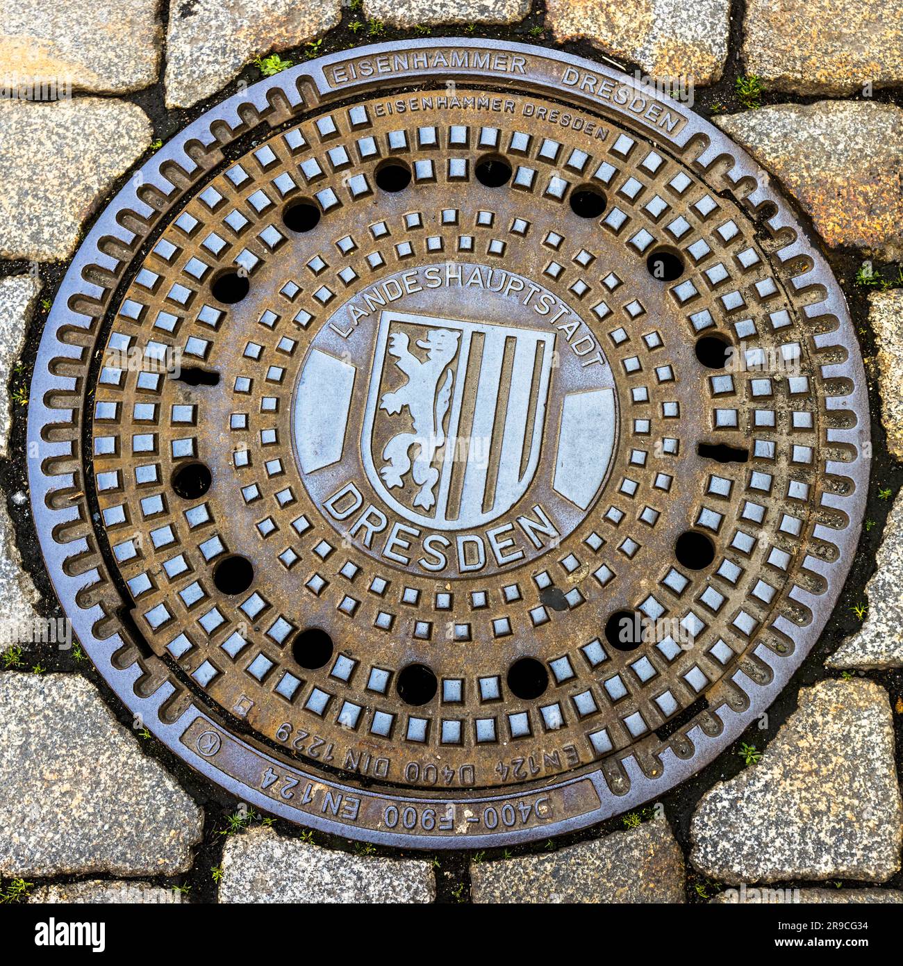 Manhole cover Dresden, Germany Stock Photo - Alamy