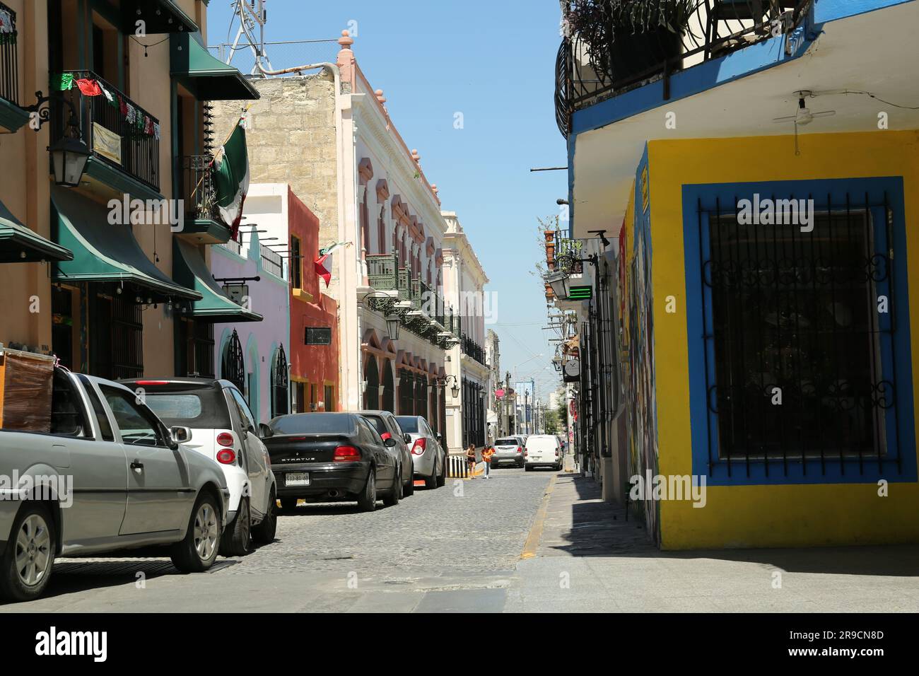 MONTERREY (NUEVO LEON), MEXICO - SEPTEMBER 29, 2022: Beautiful view of city street with parked cars on sunny day Stock Photo