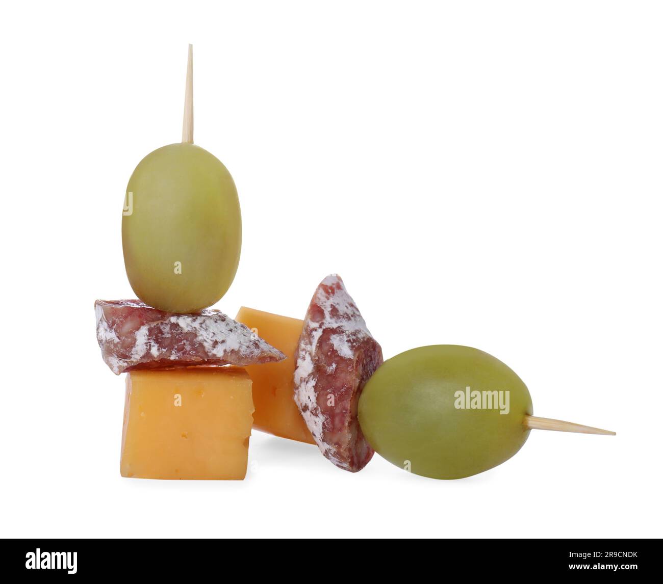 Toothpick appetizers. Tasty cheese, sausage and grapes on white