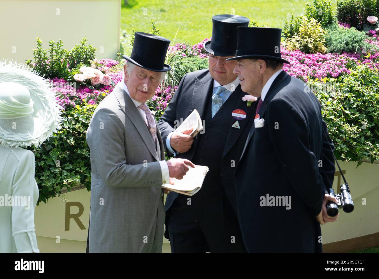 Ascot, Berkshire, UK. 22nd, June, 2023. King Charles III in the Parade Ring at Ascot Racecourse on Ladies Day chatting with Sir Francis Brooke His Majesty's Representative (M) and The Rt. Hon the Lord Soames of Fletching (R). Credit: Maureen McLean/Alamy Stock Photo