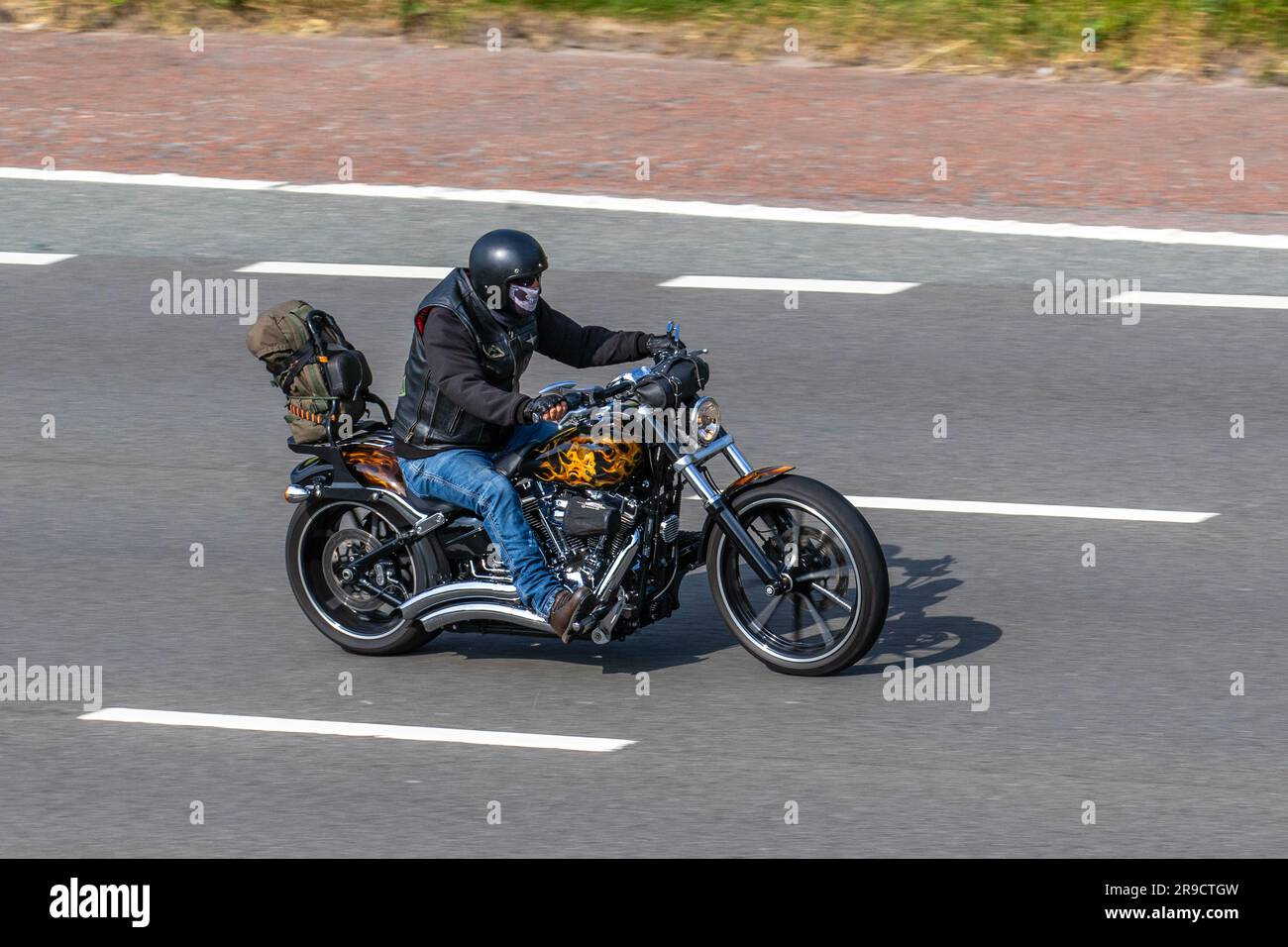Fat man on motorbike sale
