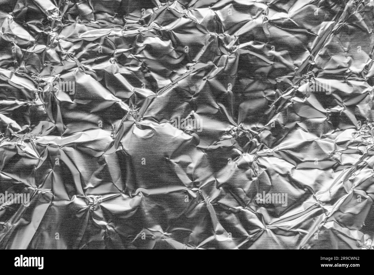Silver foil background Black and White Stock Photos & Images - Alamy