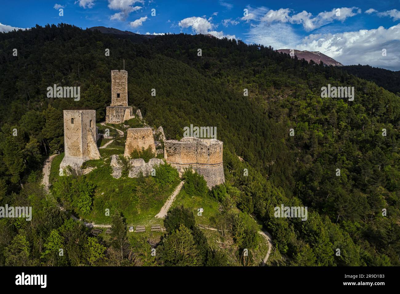 Aerial view of the Cantelmo castle in Popoli surrounded by the pine forest on Mount Morrone. Popoli, Pescara province, Abruzzo, Italy, Europe Stock Photo