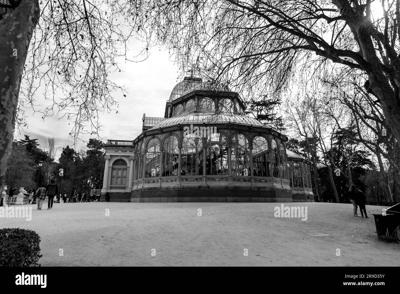 Madrid, Spain - FEB 16, 2022: El Palacio de Cristal, The Glass Palace is a conservatory located in Madrid's Buen Retiro Park. Originally designed as a Stock Photo