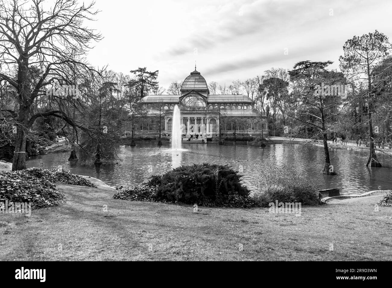 Madrid, Spain - FEB 16, 2022: El Palacio de Cristal, The Glass Palace is a conservatory located in Madrid's Buen Retiro Park. Originally designed as a Stock Photo