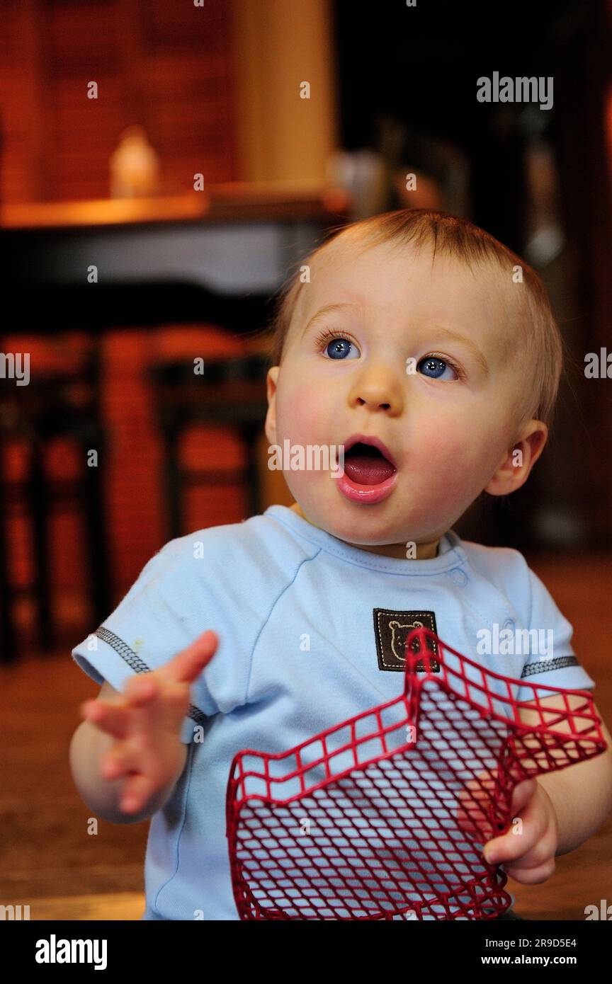 A one year old toddler boy playing Stock Photo Alamy