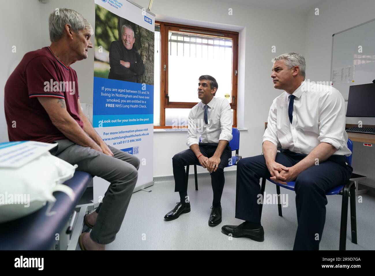 Prime Minister Rishi Sunak with Health Secretary Steve Barclay speaking to patient Terrence (no surname given) during a visit to Rivergreen Medical Centre in Nottingham. Picture date: Monday June 26, 2023. Stock Photo