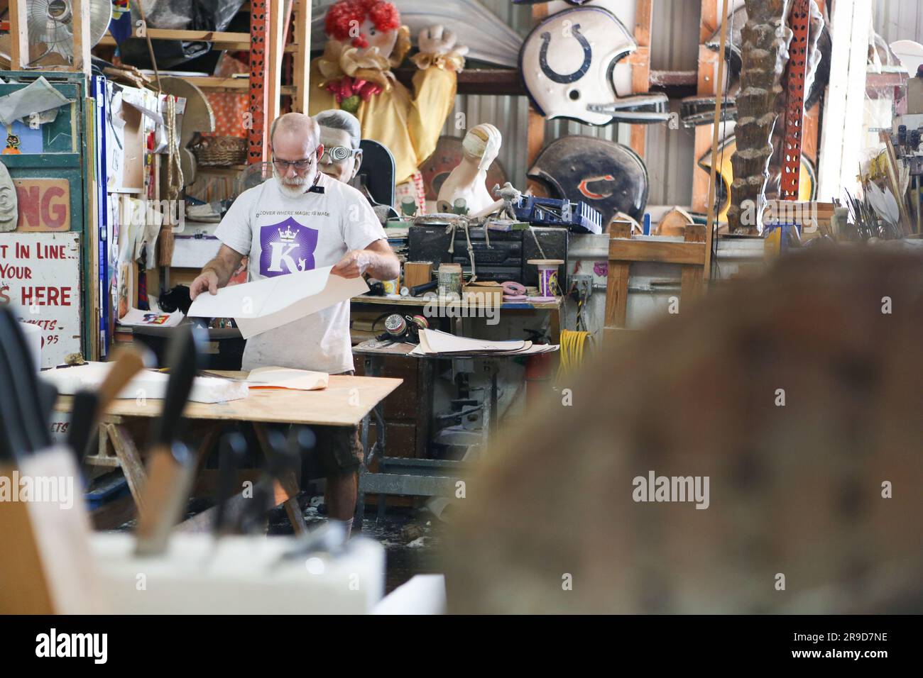 Artist working on parade float at Kern Studios in New Orleans Stock