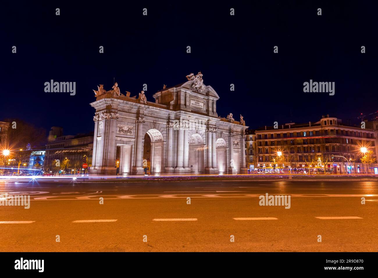 Madrid, Spain-Feb 17, 2022: The Puerta de Alcala is a Neo-classical gate in the Plaza de la Independencia in Madrid, Spain. Stock Photo