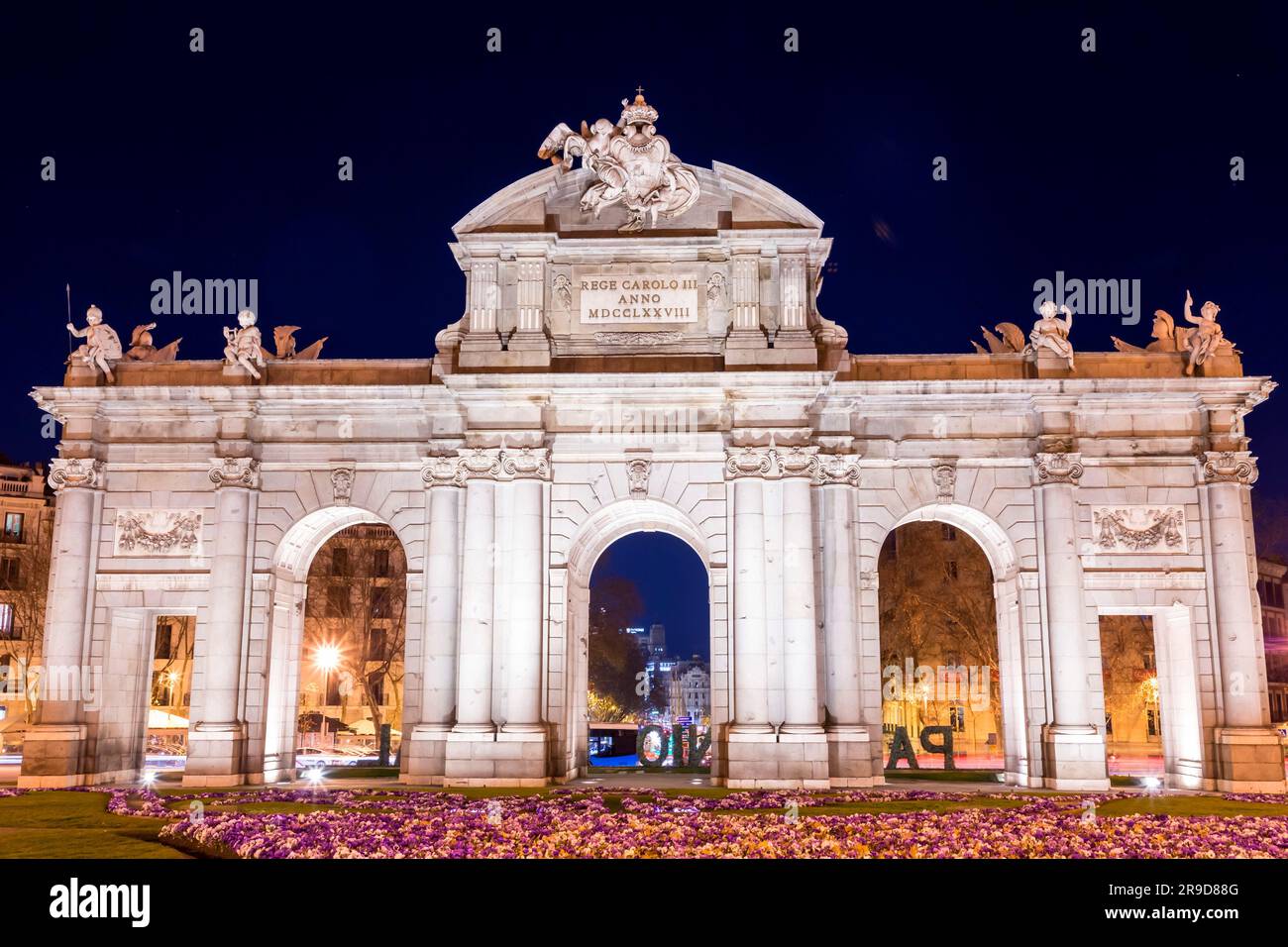 Madrid, Spain-Feb 17, 2022: The Puerta de Alcala is a Neo-classical gate in the Plaza de la Independencia in Madrid, Spain. Stock Photo