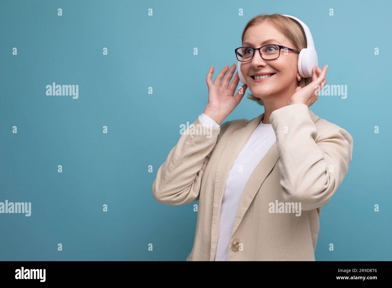 closeup portrait of a 50s middleaged business woman in a jacket