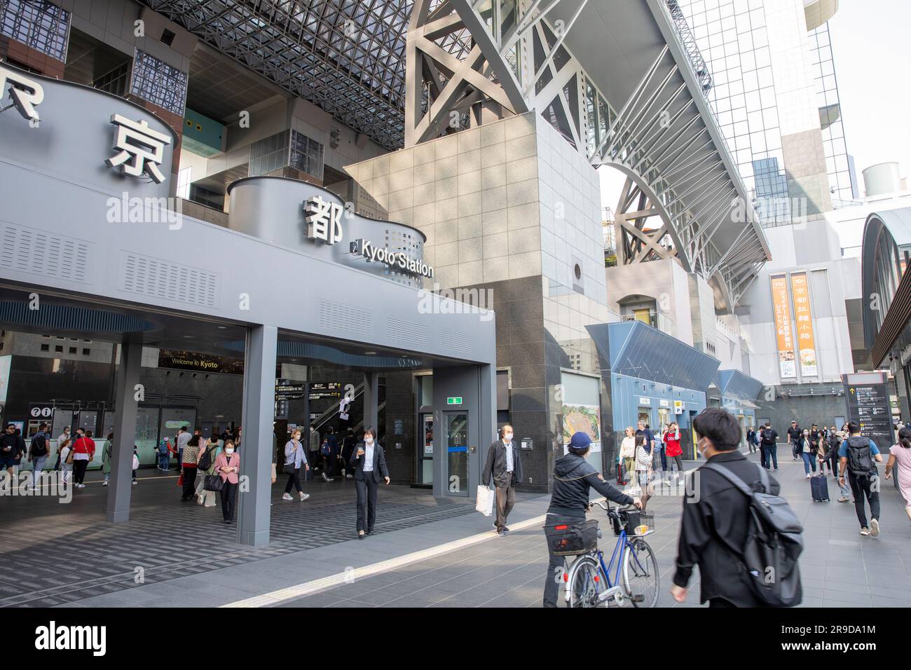 Kyoto train station, passengers and commuters outside the station
