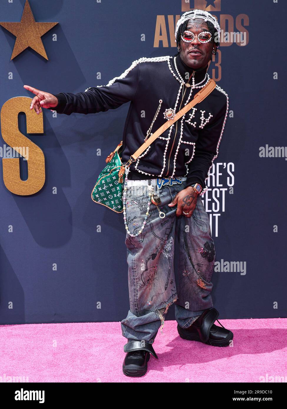 LOS ANGELES, CALIFORNIA, USA JUNE 25 Lil Uzi Vert wearing Louis