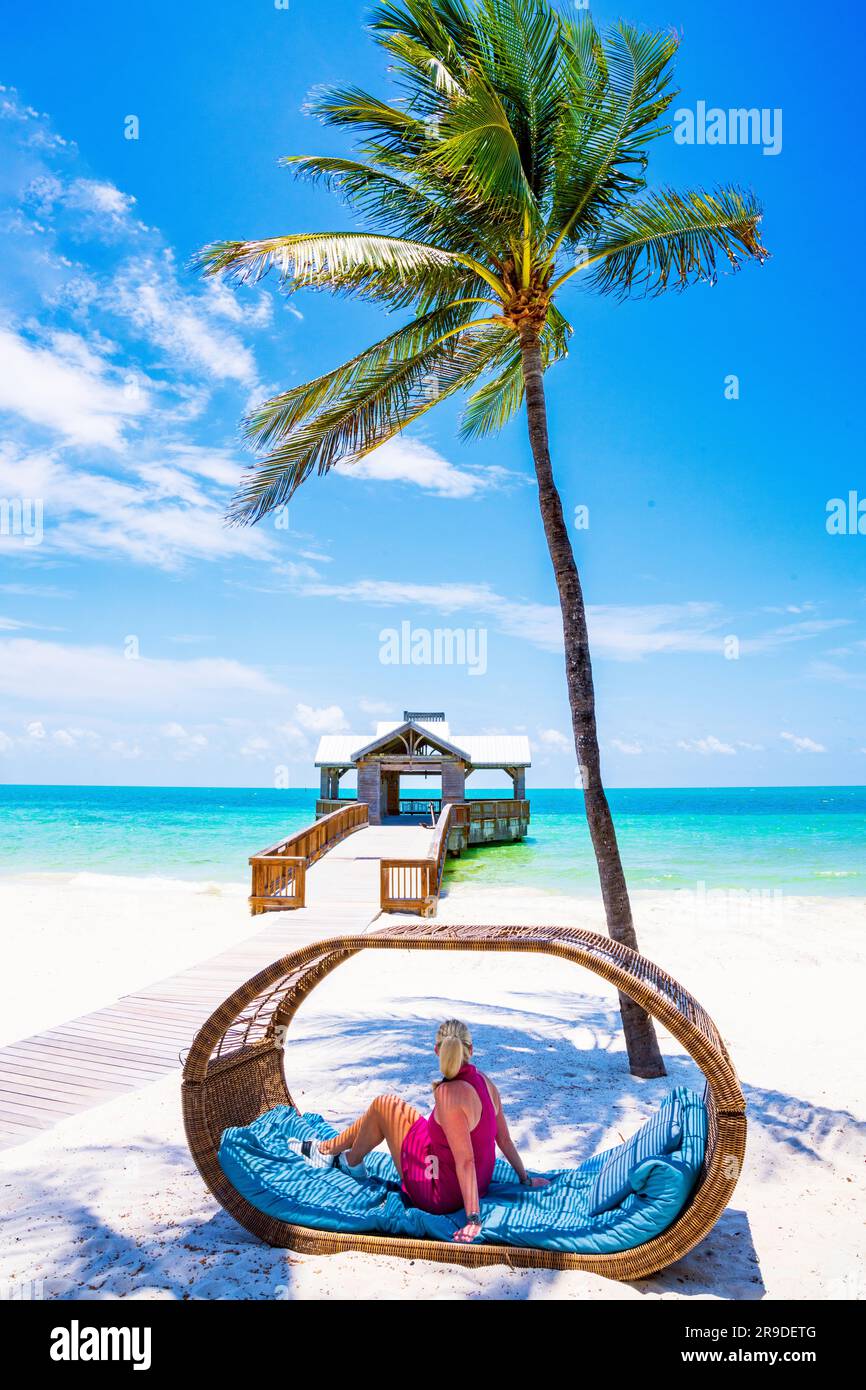 Tropical Beach with Wooden Pier  Key West, Florida, USA Stock Photo