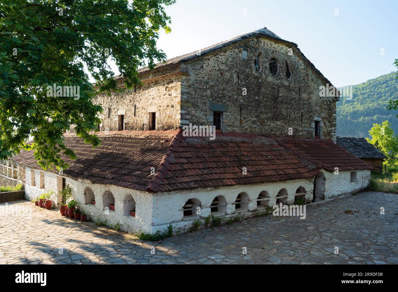 The old Church of the Assumption, dedicated to Virgin Mary, at the traditional village of Ano Skotina in northern Greece Stock Photo