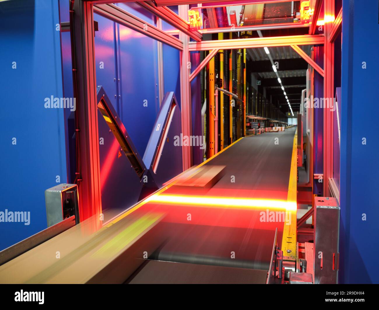 Hamburg, Germany. 26th June, 2023. Test parcels pass through the laserassisted sorting station