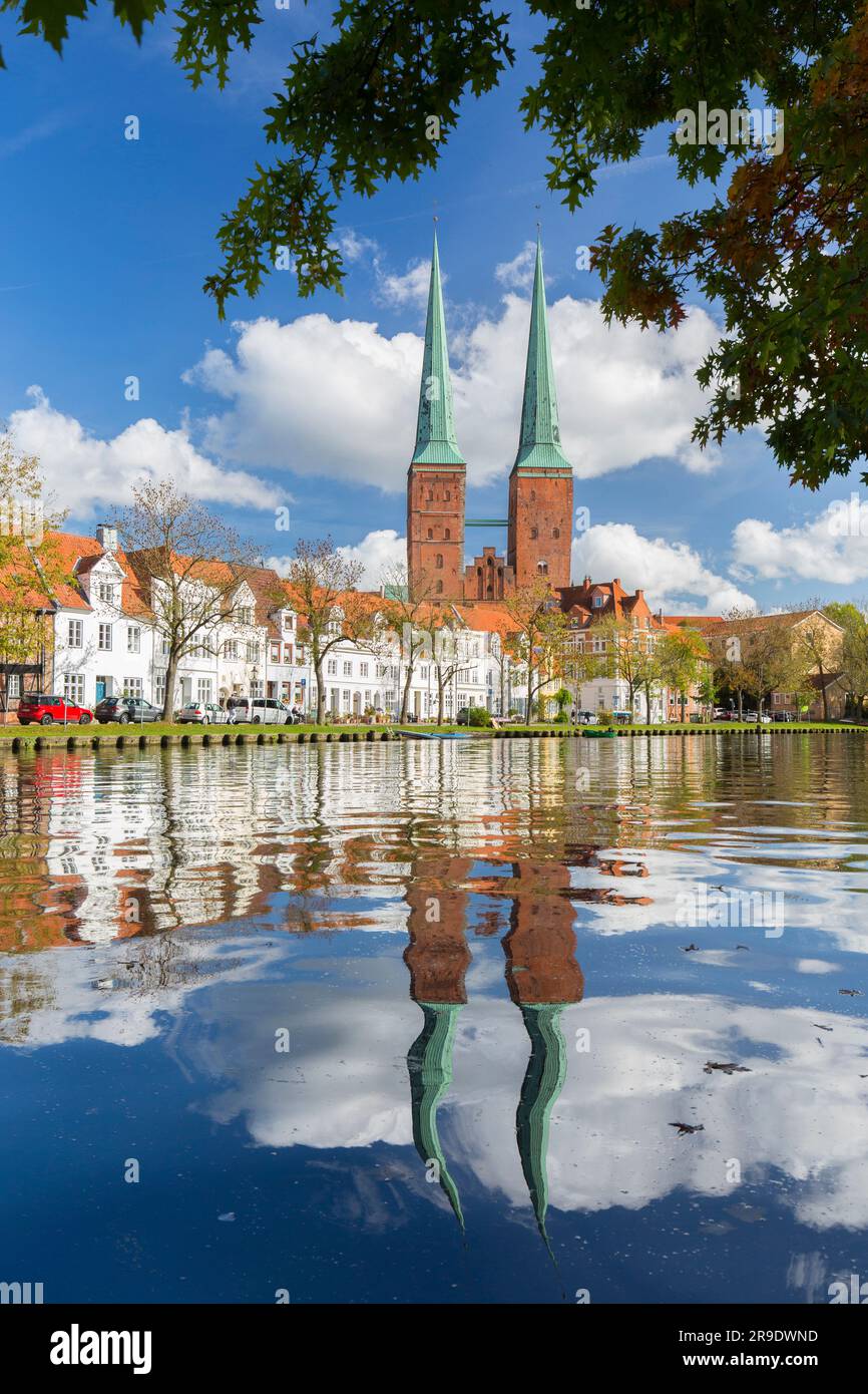 Luebeck Cathedral and residential buildings at the river Trave. Schleswig-Holstein, Germany Stock Photo