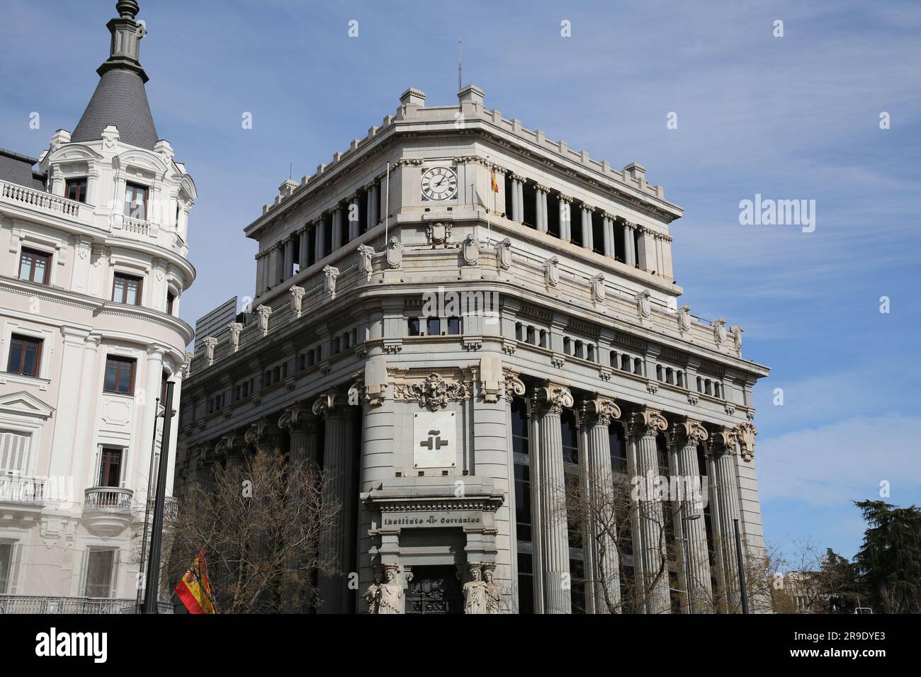 Madrid, Spain - FEB 16, 2022: Cityscape and architecture at the Calle de Alcala, Madrid. Facade view of the Cervantes Institution. Stock Photo