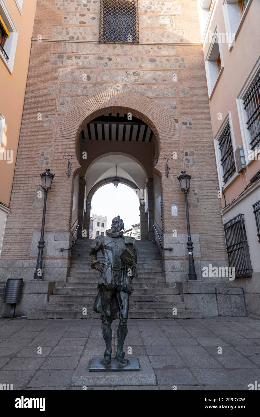Toledo, SpainFEB 17, 2022 Statue of Cervantes by the Arco de la