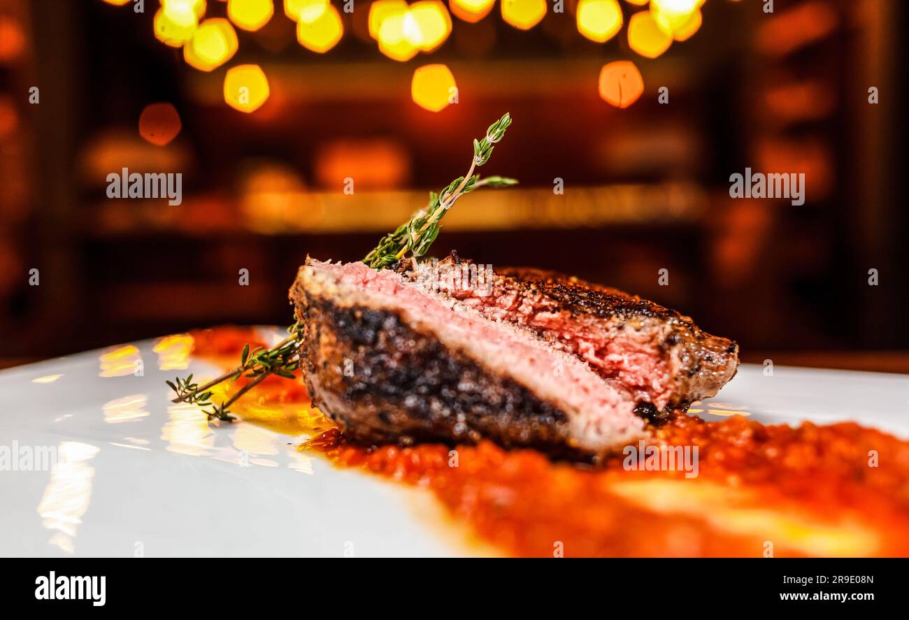 https://c8.alamy.com/comp/2R9E08N/a-close-up-of-a-freshly-prepared-dish-with-chunks-of-meat-in-focus-surrounded-by-other-ingredients-that-make-up-the-meal-2R9E08N.jpg