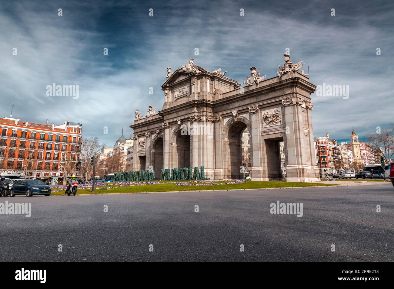 Madrid, Spain - Feb 16, 2022: The Puerta de Alcala is a Neoclassical gate in the Plaza de la Independencia in Madrid, Spain. Stock Photo