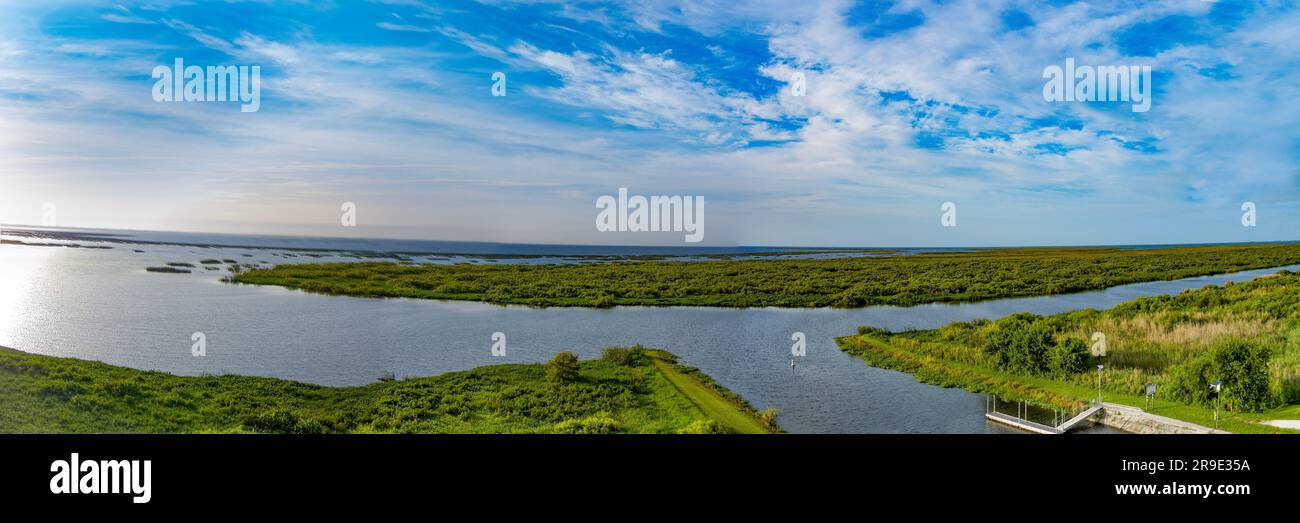 An view of Lake Okeechobee surrounded by lush greenery in Florida, the United States Stock Photo