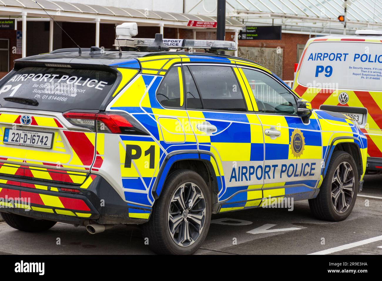 Dublin Airport, terminal one and airport police vehicles. Stock Photo