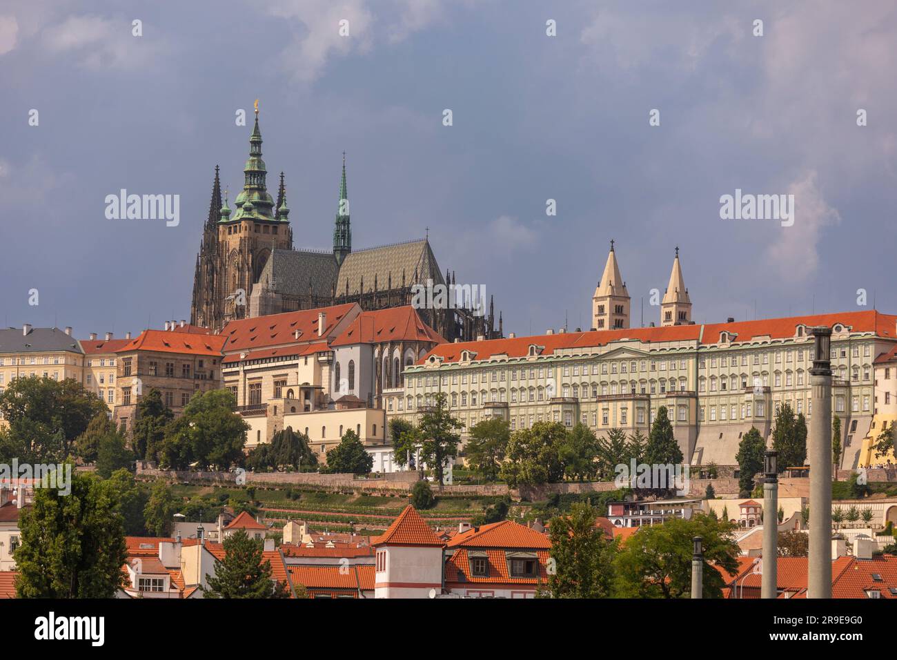 PRAGUE, CZECH REPUBLIC, EUROPE - Prague Castle, and spires of St Vitus Cathedral, above. Stock Photo