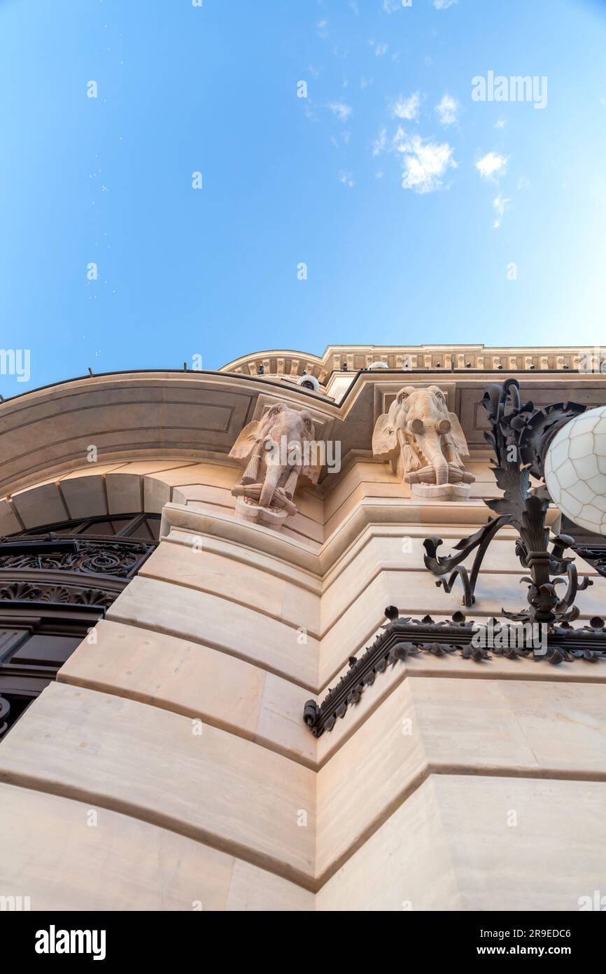 Column supports in elephant head shape on the exterior of a building in Madrid, Spain. Stock Photo