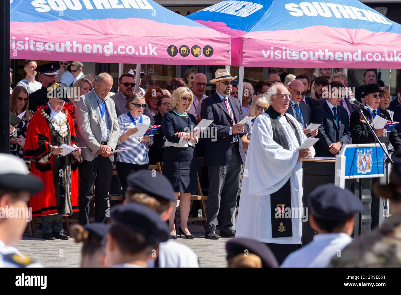MPs Anna Firth and James Duddridge with local councillors singing at an Armed Forces Day event in the High Street, Southend on Sea, Essex, UK Stock Photo